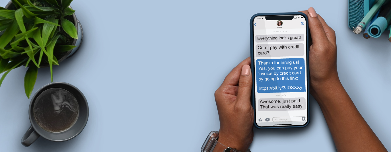 hands holding cell phone with messages displayed